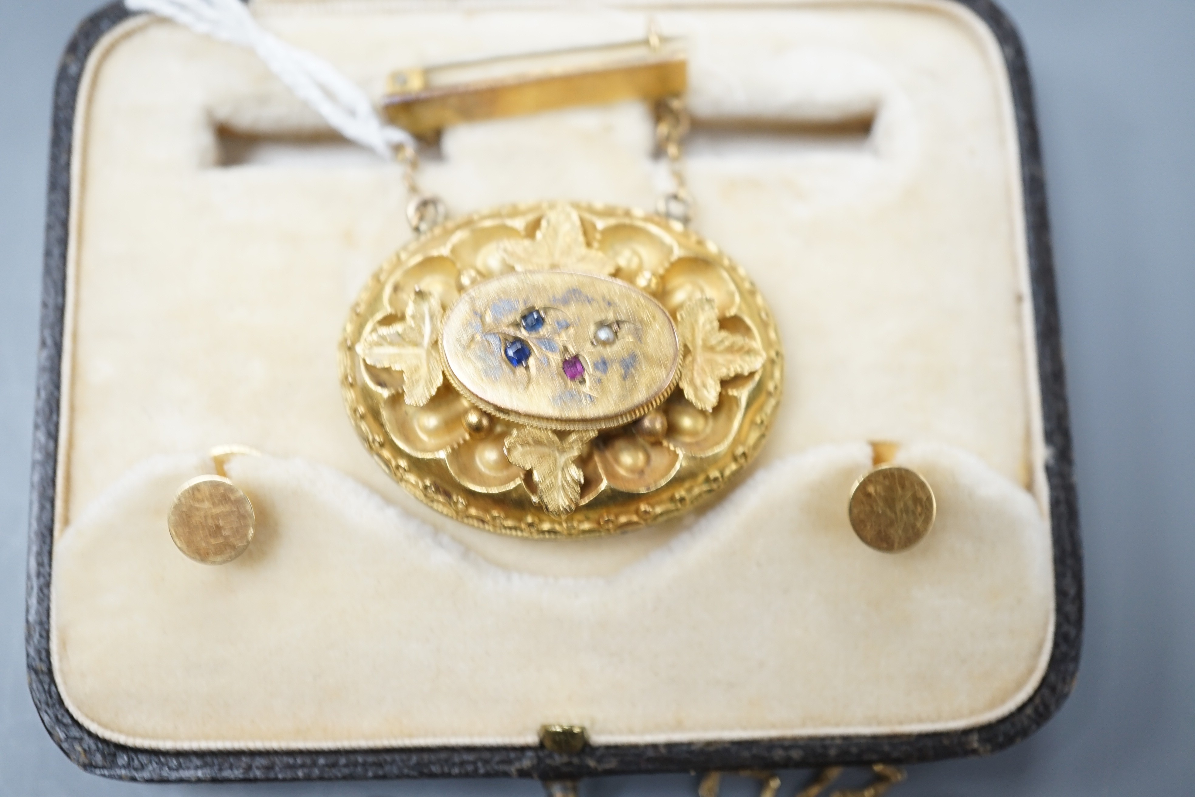 A 22ct gold wedding band 2.3 grams, a Victorian yellow metal and gem set oval brooch and other jewellery